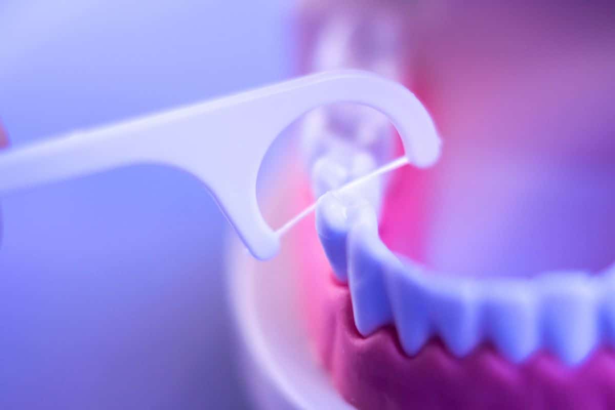 flossing dental bridge